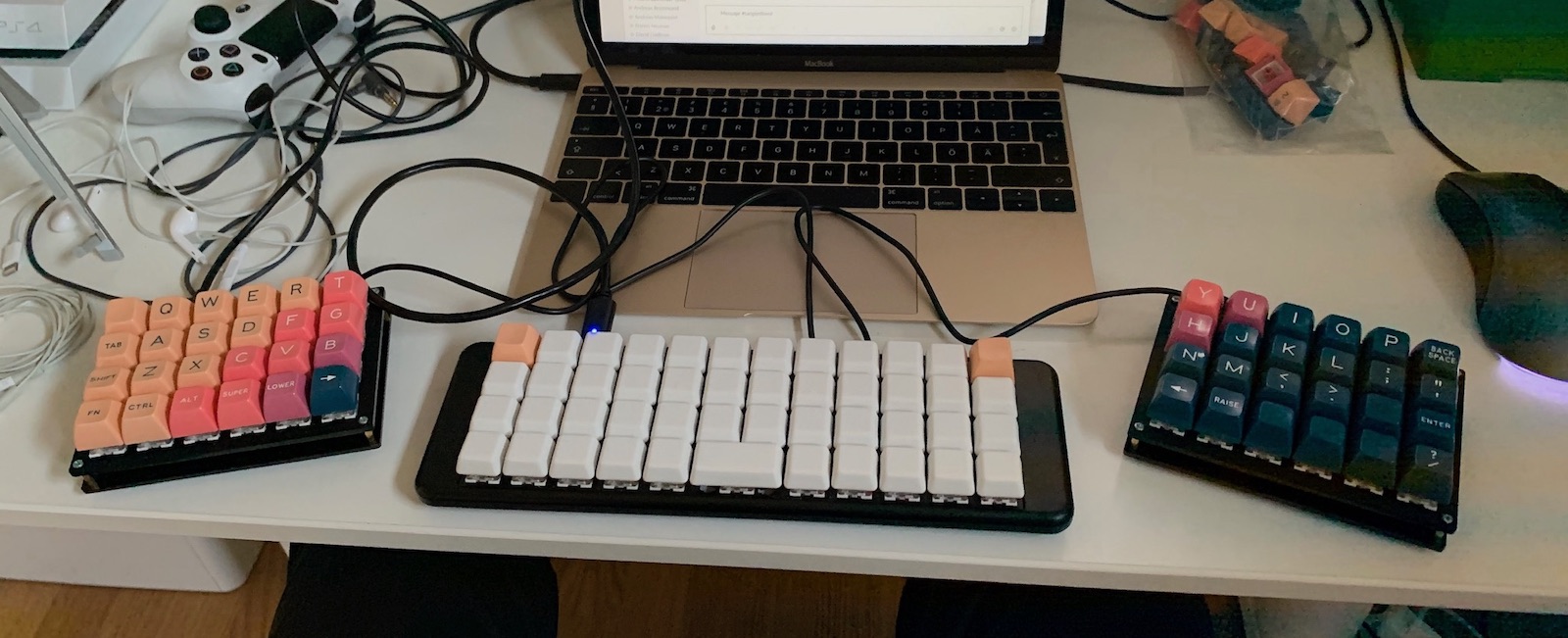 Two 40% keyboards, one split