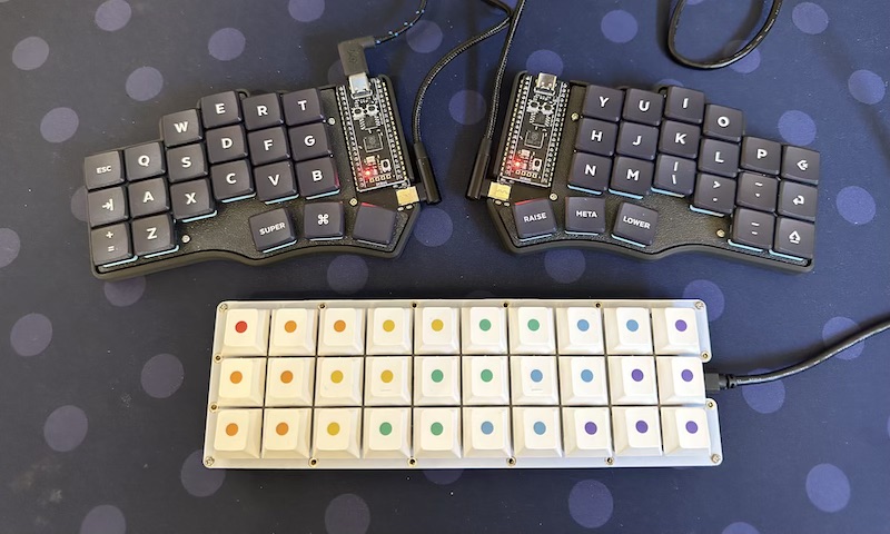 Gherkin next to Piantor - a split 42 key keyboard