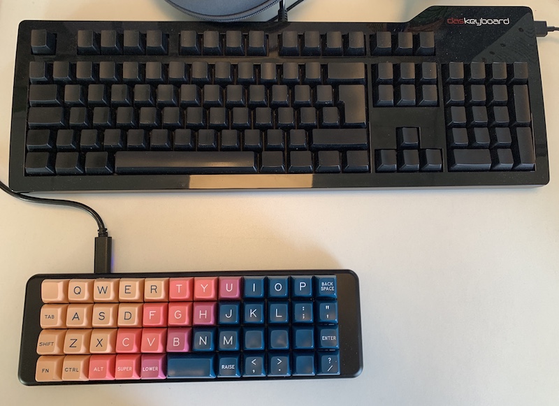 KBD4X next to Das Keyboard