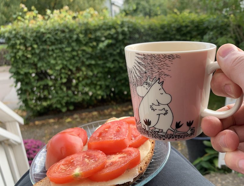 Drinking coffee on the steps
